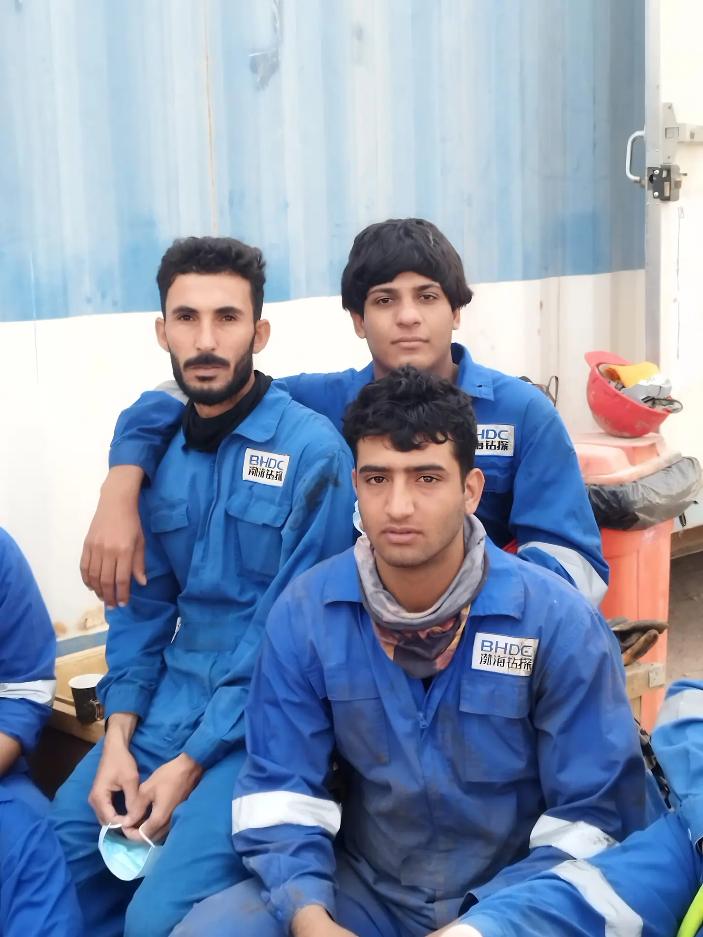 Crew members at a site camp