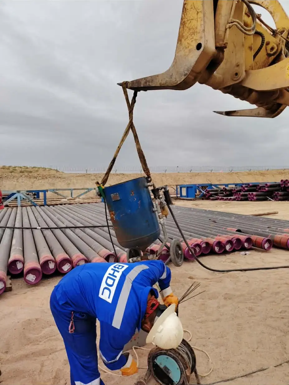 Crane-assisted casing handling